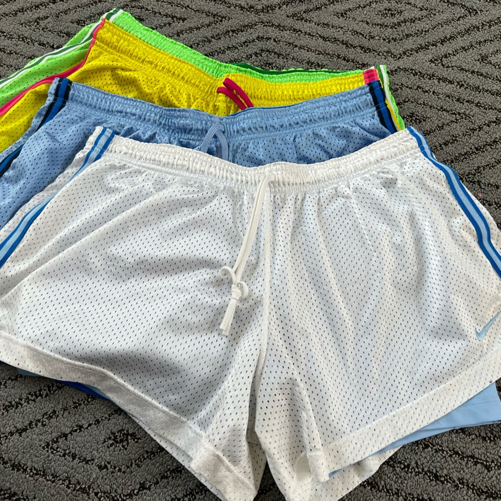 4 pairs of Nike Dri-fit athletic shorts, built in spandex unders XL